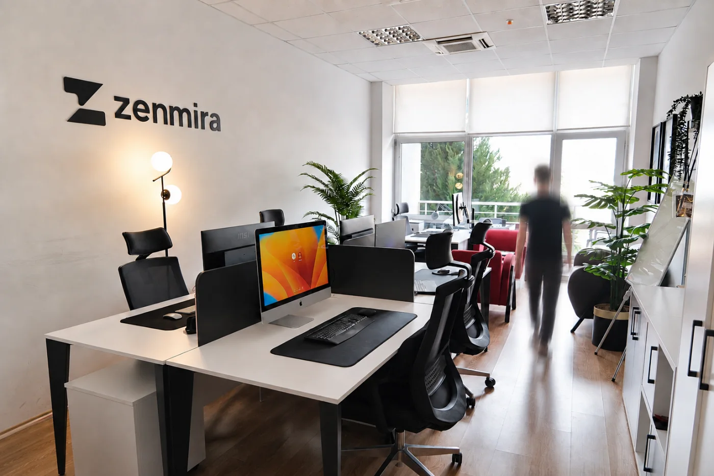 Zenmira Denizli Teknokent office — desks in front of the branded wall